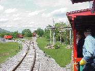 Whittier Station, first stop on way up - logging equipment in background.